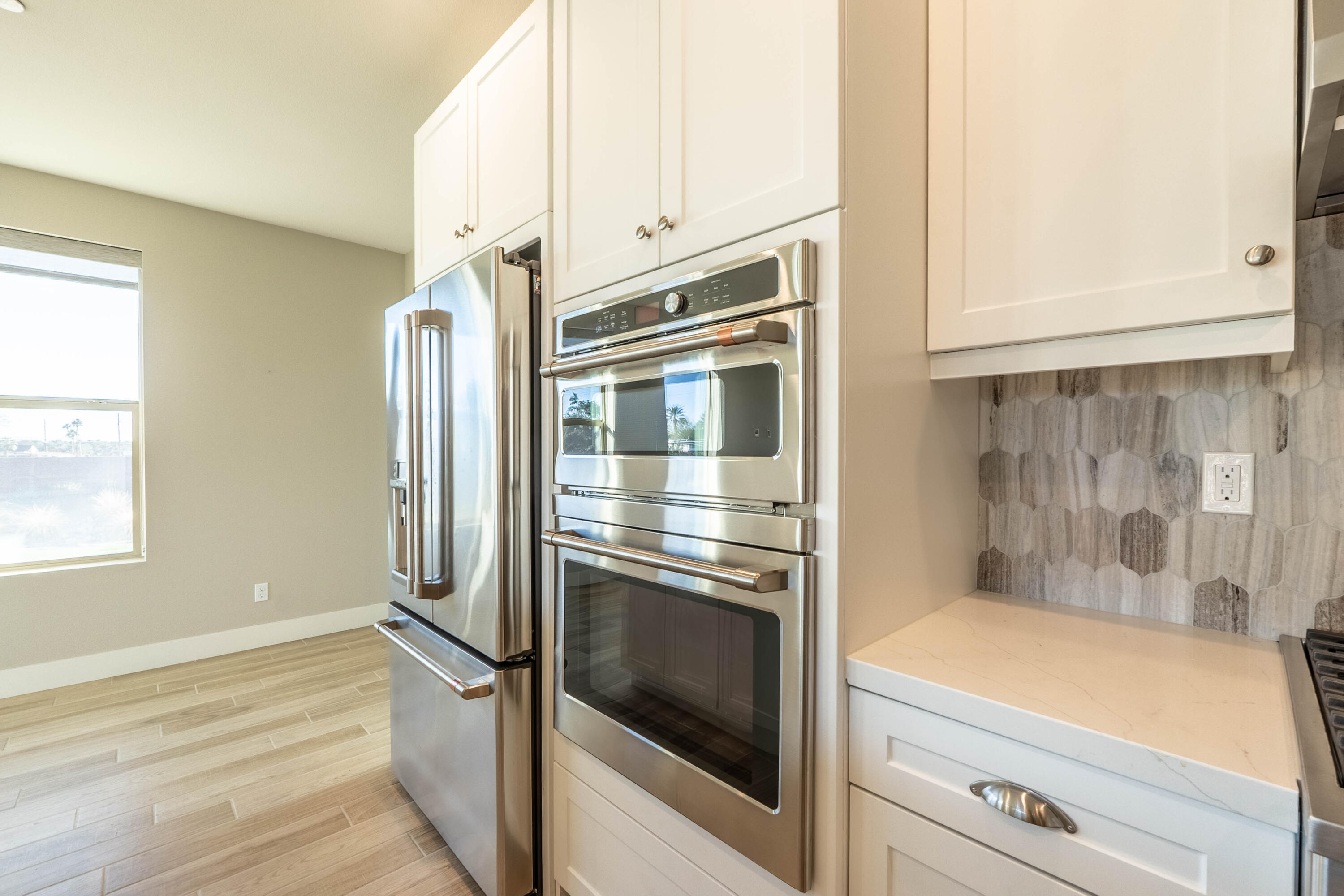 51502 Mastic Way Indio, CA 92201 - Photo 13 of 29 a kitchen with stainless steel appliances granite countertop a refrigerator and a stove