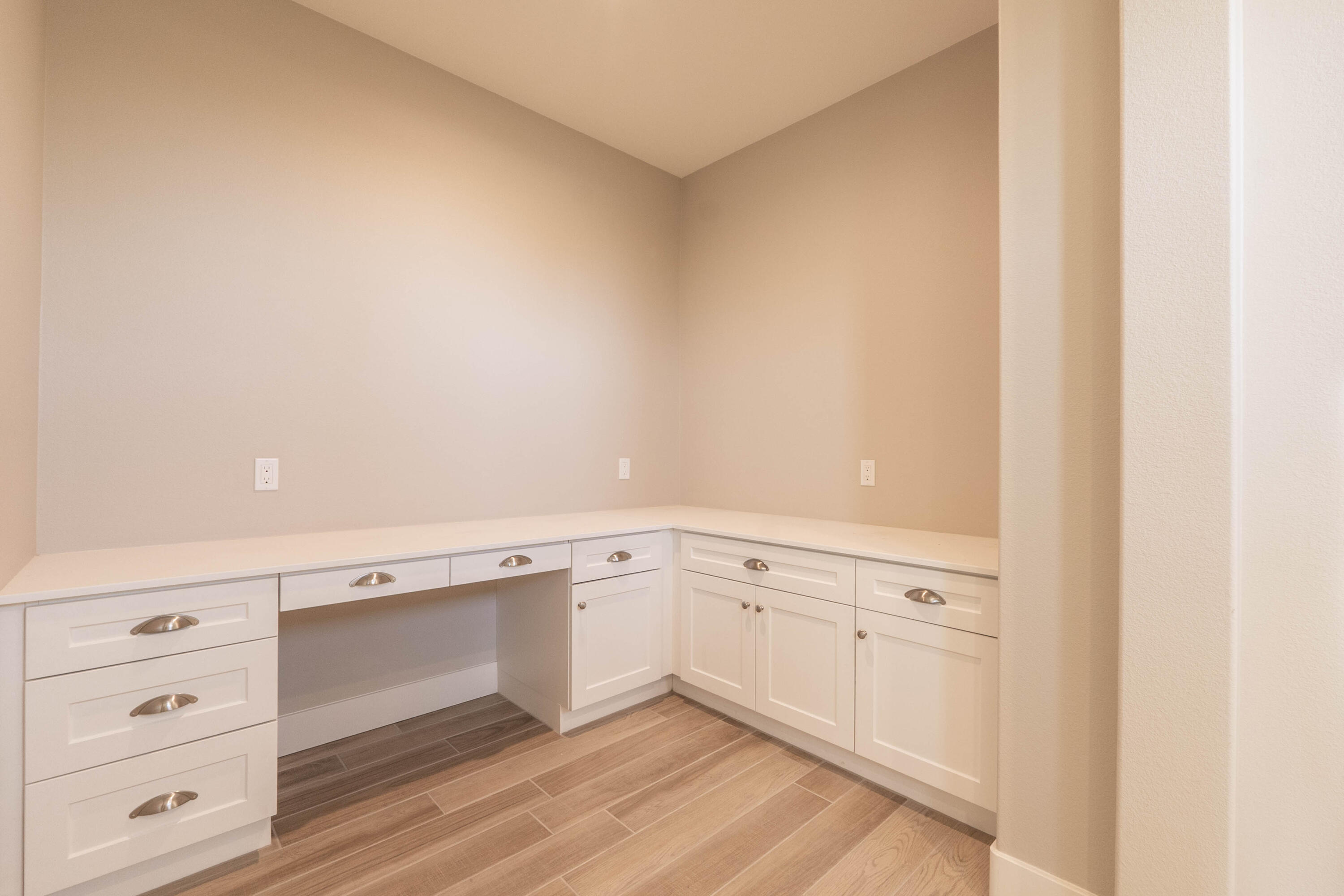 51502 Mastic Way Indio, CA 92201 - Photo 18 of 29 a view of cabinets with wooden floor