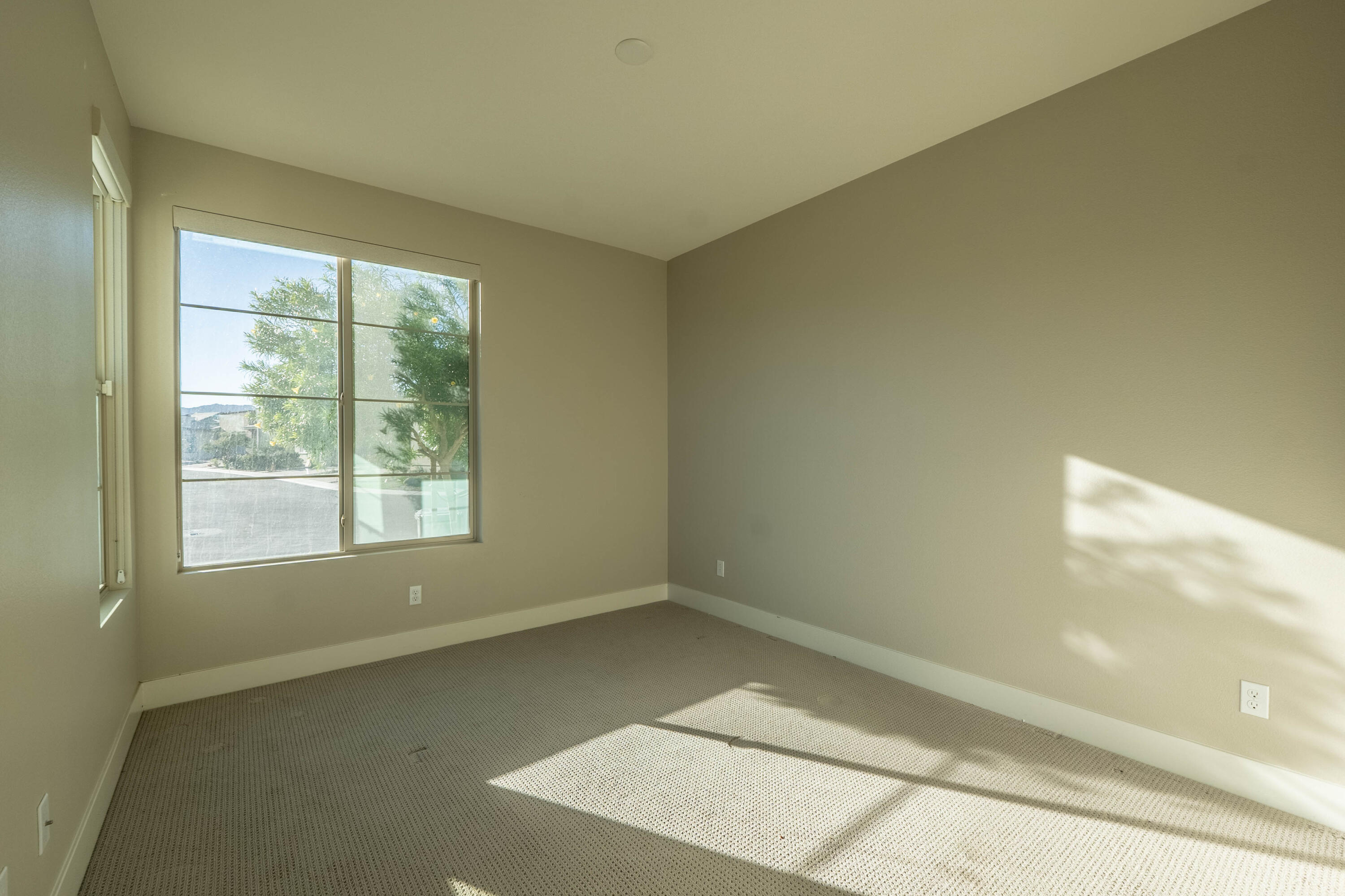 51502 Mastic Way Indio, CA 92201 - Photo 19 of 29 an empty room with a window