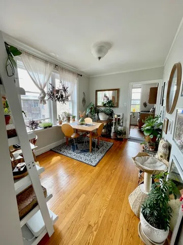a living room with furniture fireplace and a flat screen tv