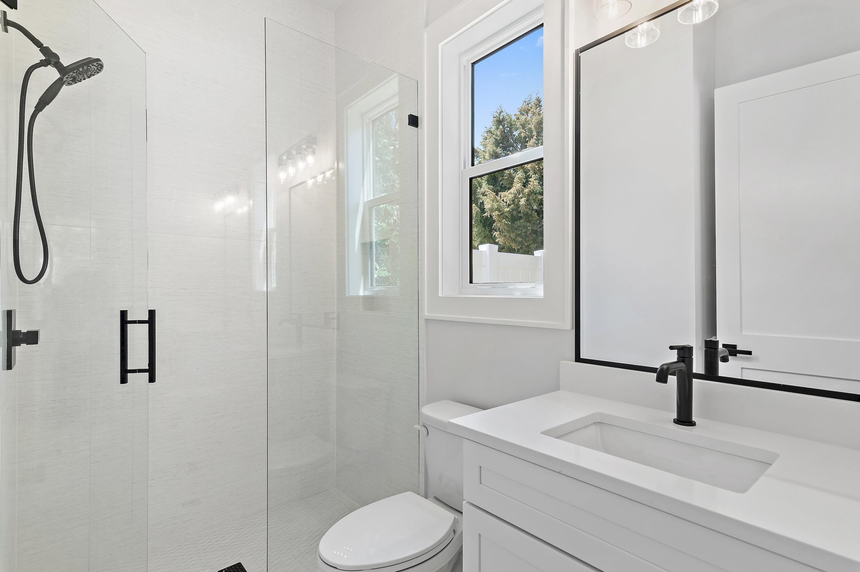 22 Henderson Place Santa Rosa Beach, FL 32459 - Photo 19 of 33 a bathroom with a sink toilet and shower