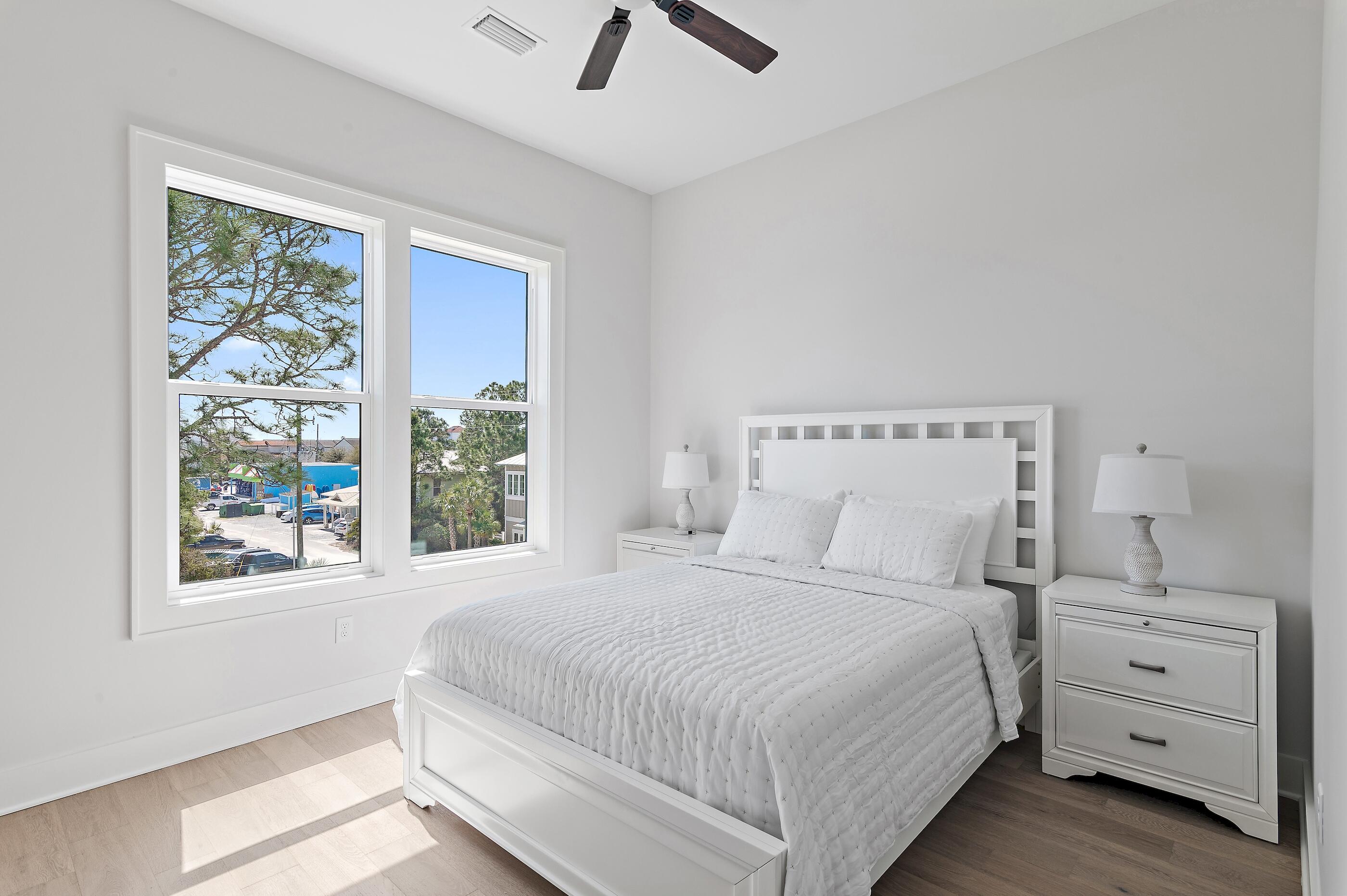 22 Henderson Place Santa Rosa Beach, FL 32459 - Photo 23 of 33 a bedroom with a bed and a window