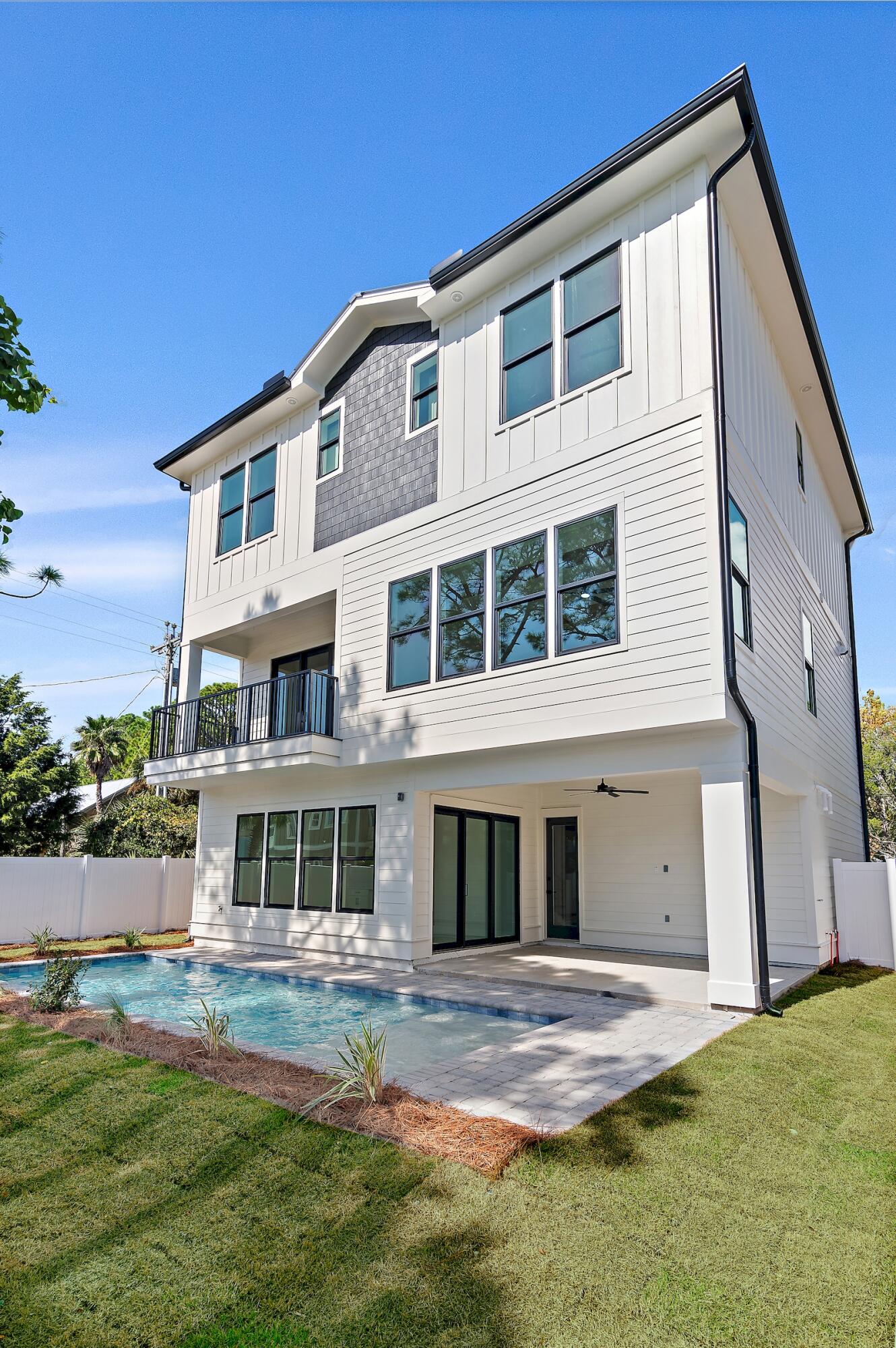 22 Henderson Place Santa Rosa Beach, FL 32459 - Photo 31 of 33 a front view of a house with a yard