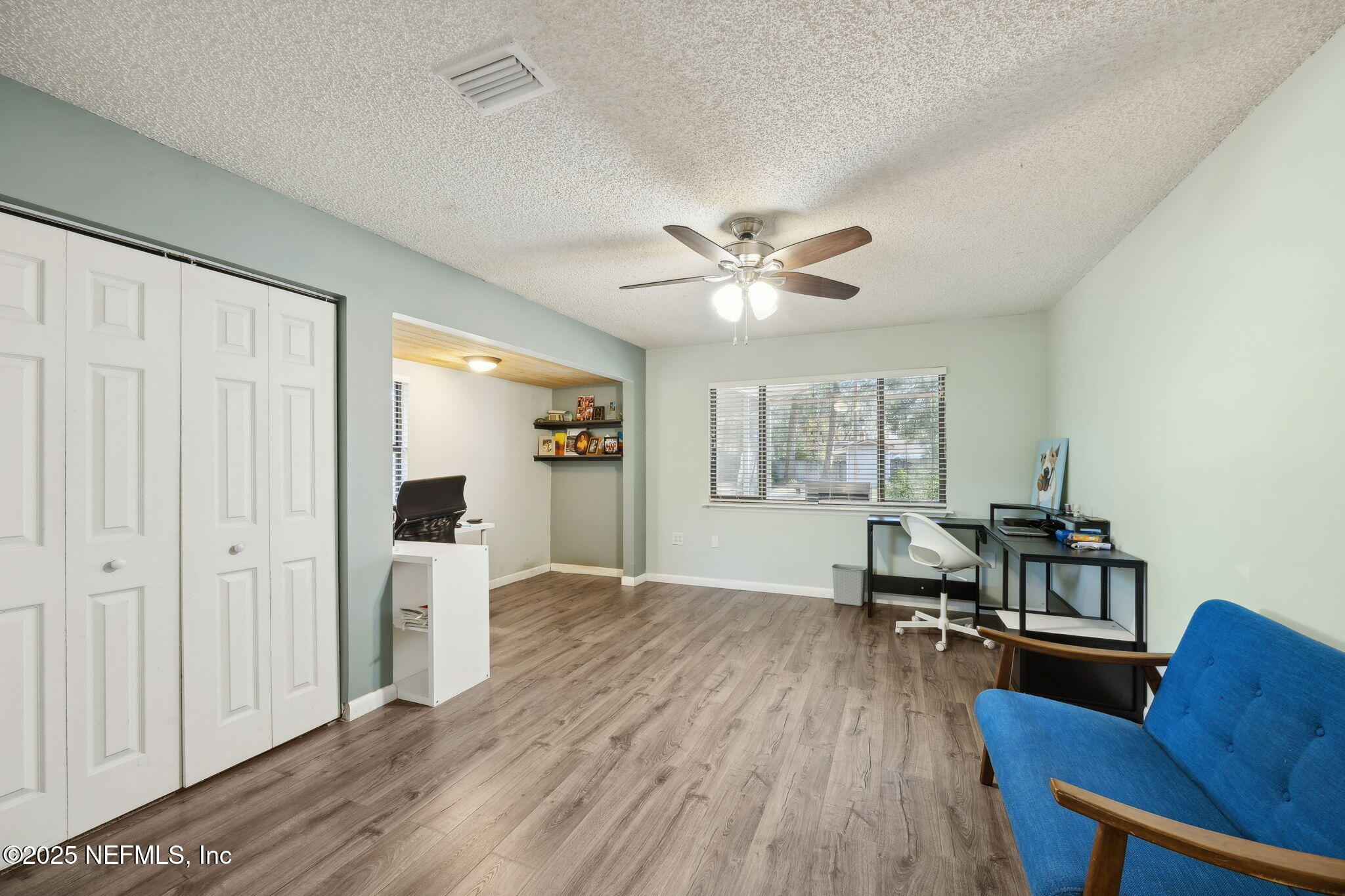 225 San Pablo Road North Jacksonville, FL 32225 - Photo 11 of 38 a view of a livingroom with furniture and wooden floor