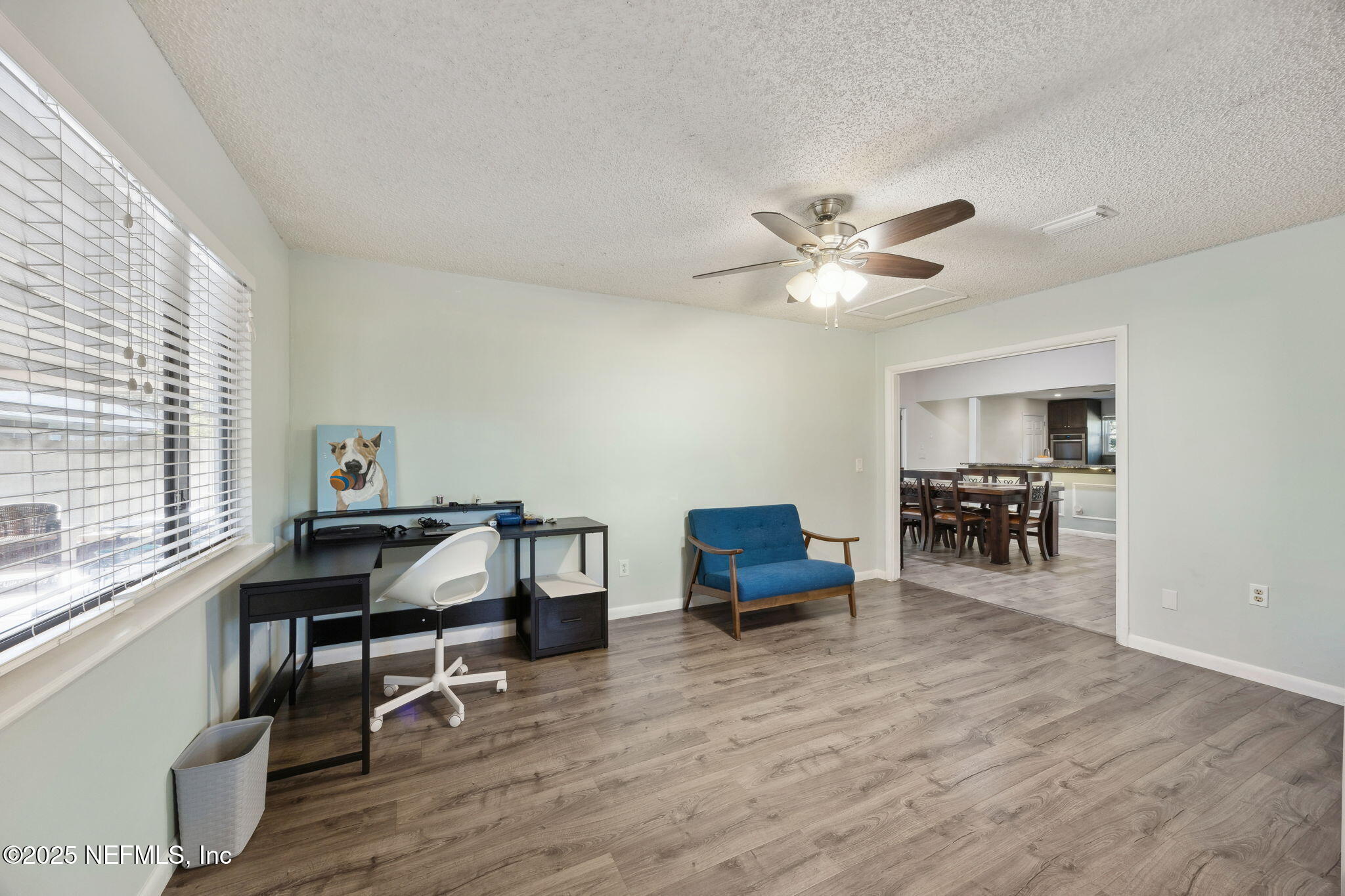 225 San Pablo Road North Jacksonville, FL 32225 - Photo 12 of 38 a work room with furniture and a window