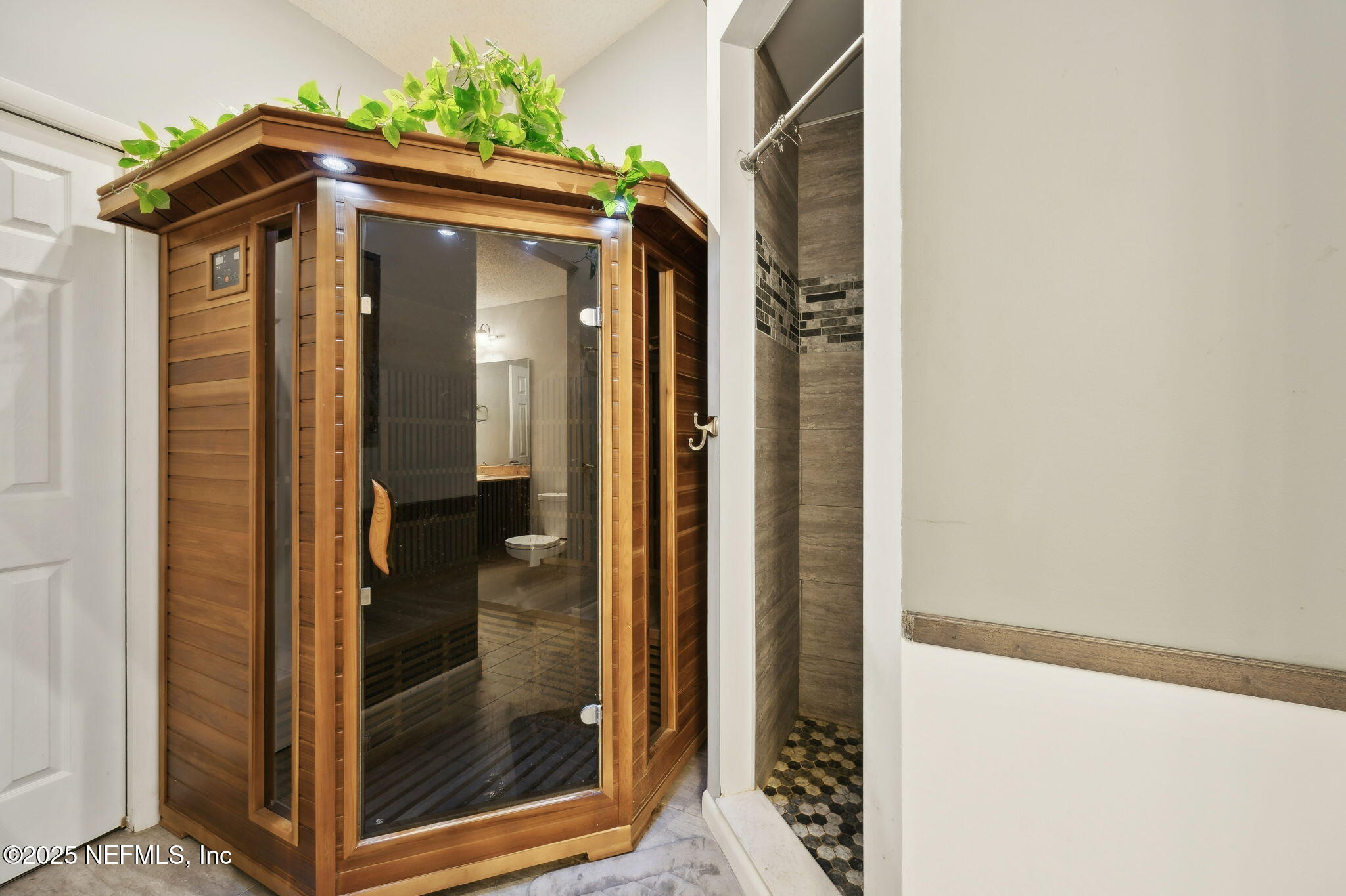 225 San Pablo Road North Jacksonville, FL 32225 - Photo 22 of 38 a view of a glass door of the house