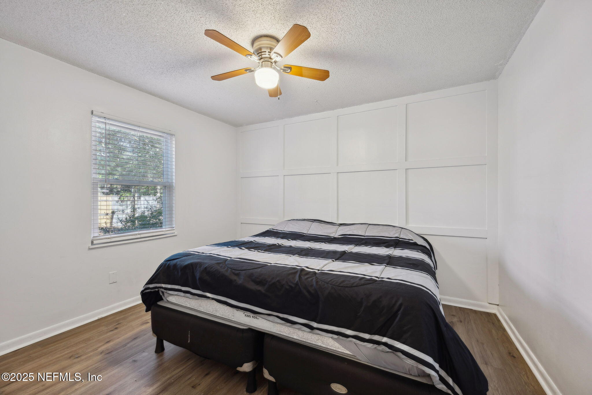 225 San Pablo Road North Jacksonville, FL 32225 - Photo 24 of 38 a bedroom with a bed and a window