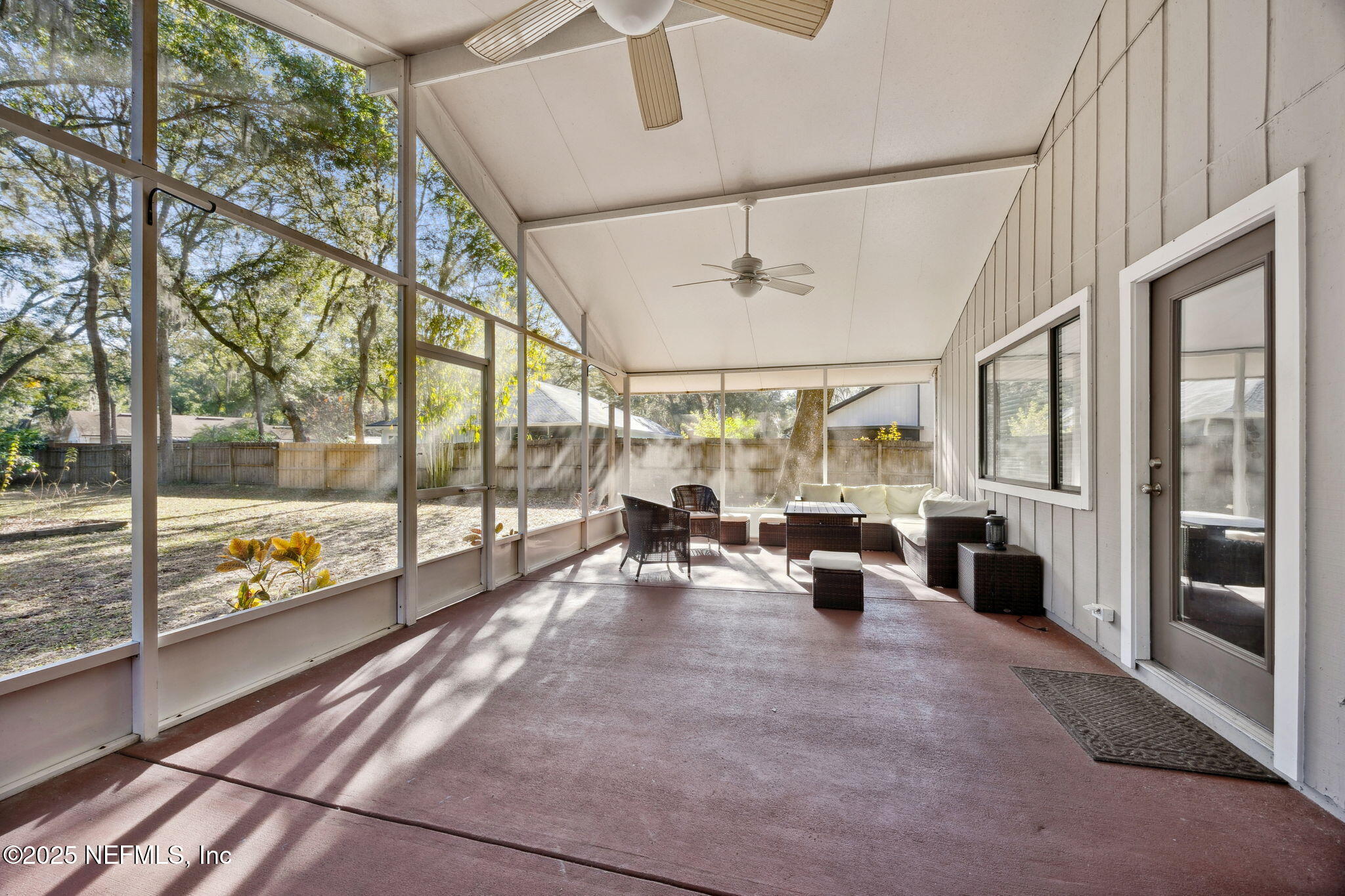 225 San Pablo Road North Jacksonville, FL 32225 - Photo 32 of 38 a living room with furniture and a large window