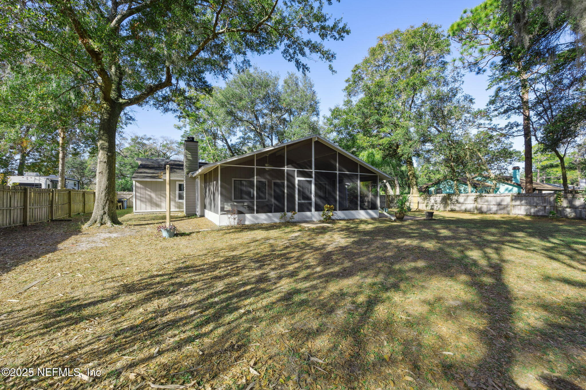 225 San Pablo Road North Jacksonville, FL 32225 - Photo 35 of 38 a house with trees in the background