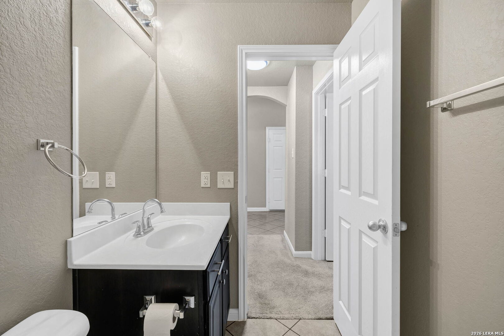 4015 Shervin Way Converse, TX 78109 - Photo 34 of 43 a bathroom with a sink and a mirror