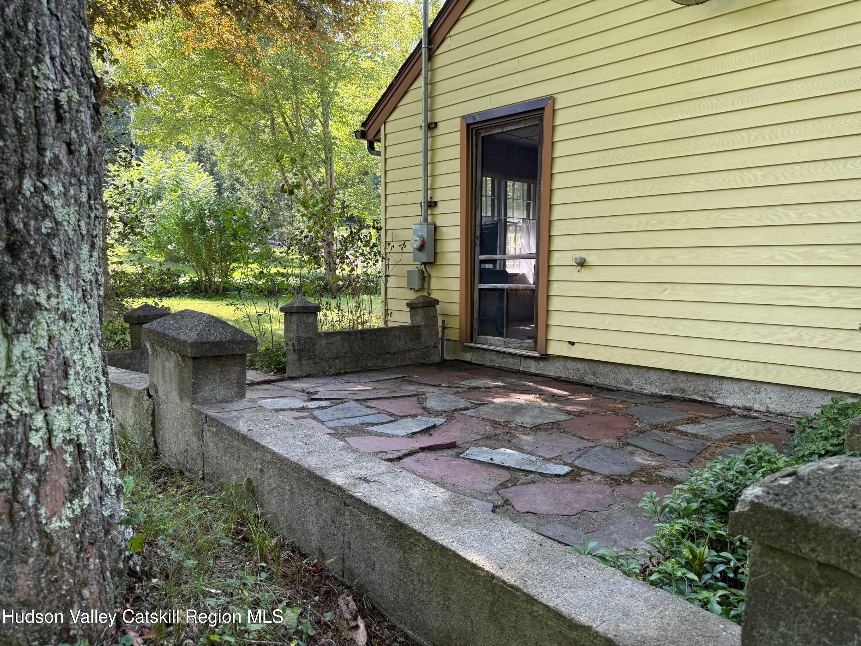 472 Doodletown Road Ancram, NY 12502 - Photo 17 of 23 a view of a house with backyard and garden