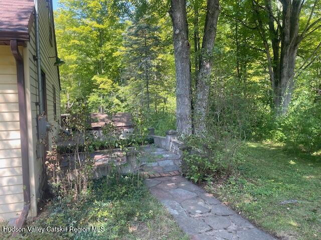 472 Doodletown Road Ancram, NY 12502 - Photo 18 of 23 a backyard of a house with lots of green space and fountain
