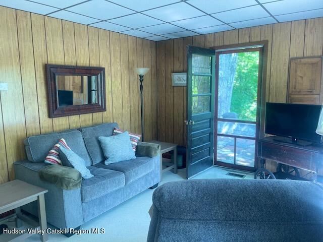 472 Doodletown Road Ancram, NY 12502 - Photo 6 of 23 a living room with furniture and a flat screen tv