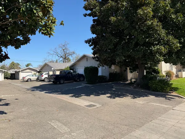 a view of garage and yard