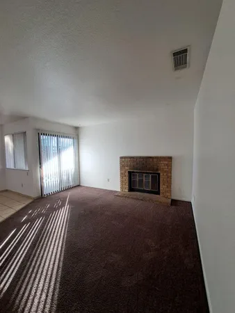 a kitchen with sink cabinets and window