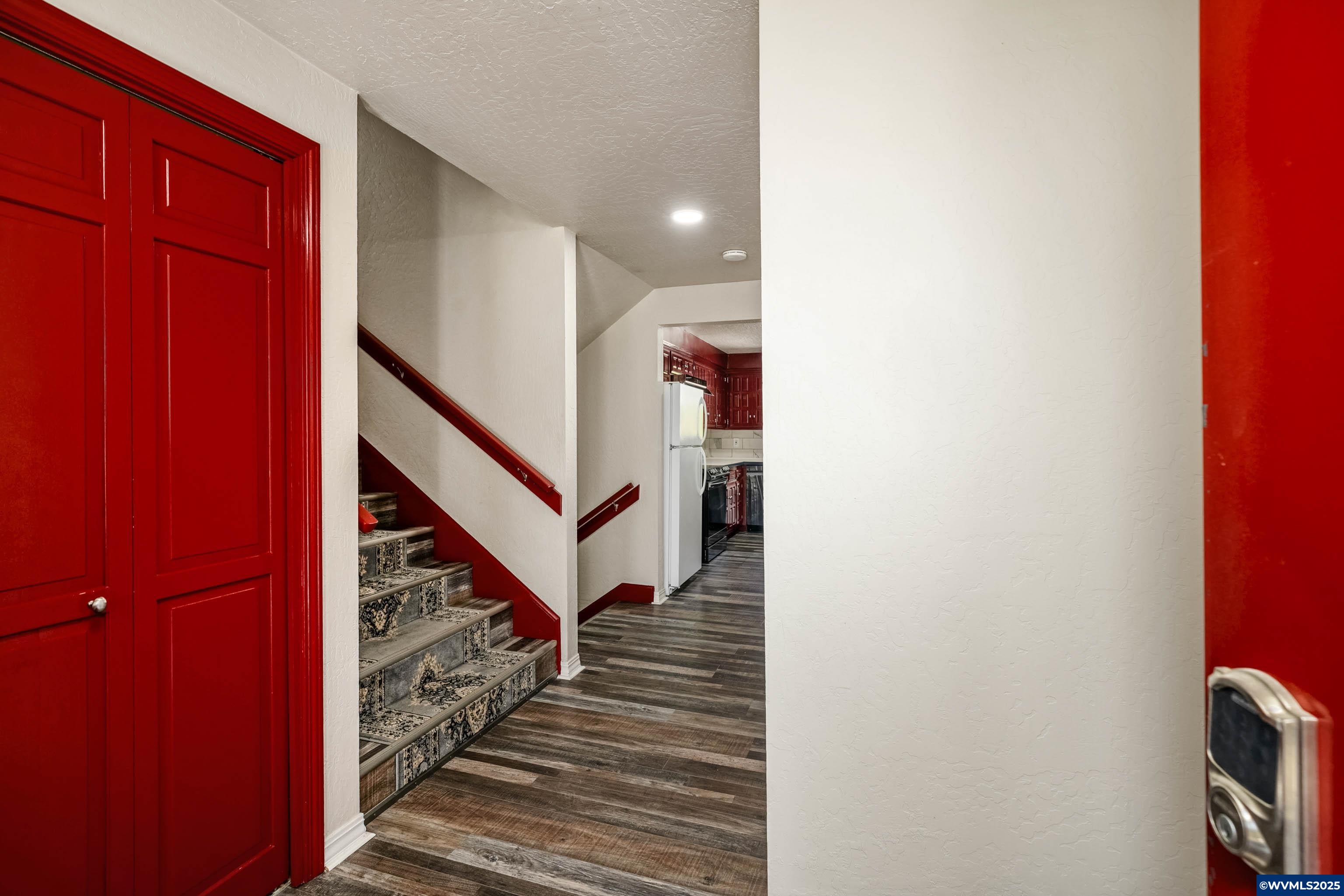 16170 McBee Road Dallas, OR 97338 - Photo 5 of 41 a view of a hallway with wooden floor and staircase