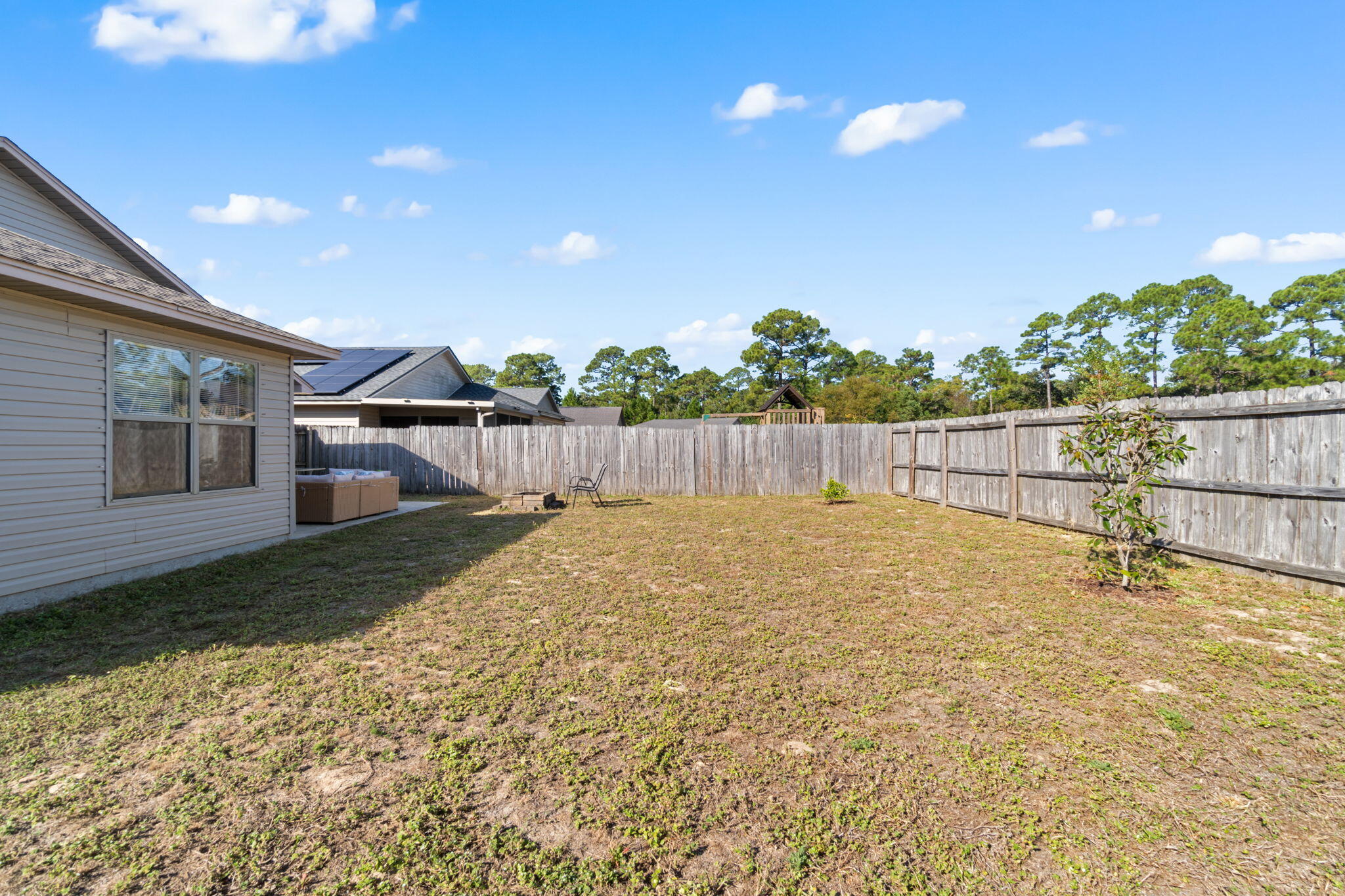 7964 Promise Creek Road Navarre, FL 32566 - Photo 39 of 43 a view of a backyard