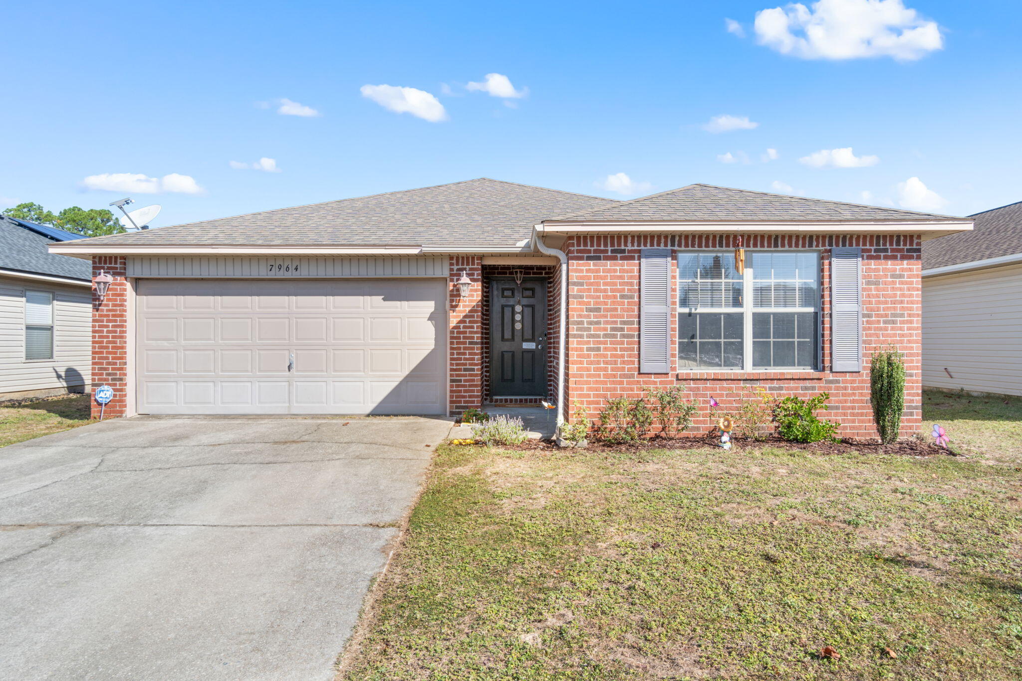 7964 Promise Creek Road Navarre, FL 32566 - Photo 43 of 43 a front view of a house