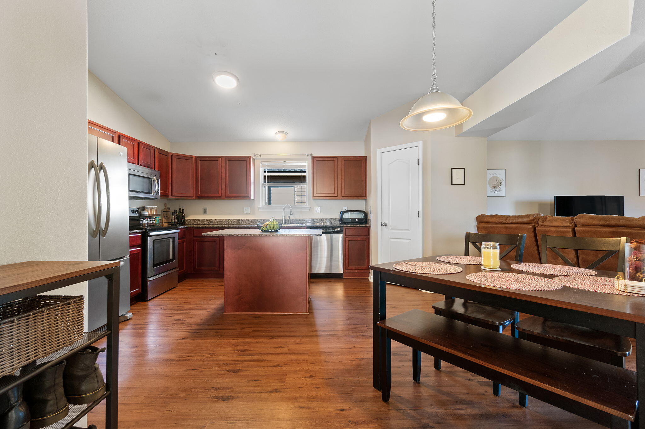 7964 Promise Creek Road Navarre, FL 32566 - Photo 7 of 43 a large kitchen with stainless steel appliances lots of counter space and a refrigerator