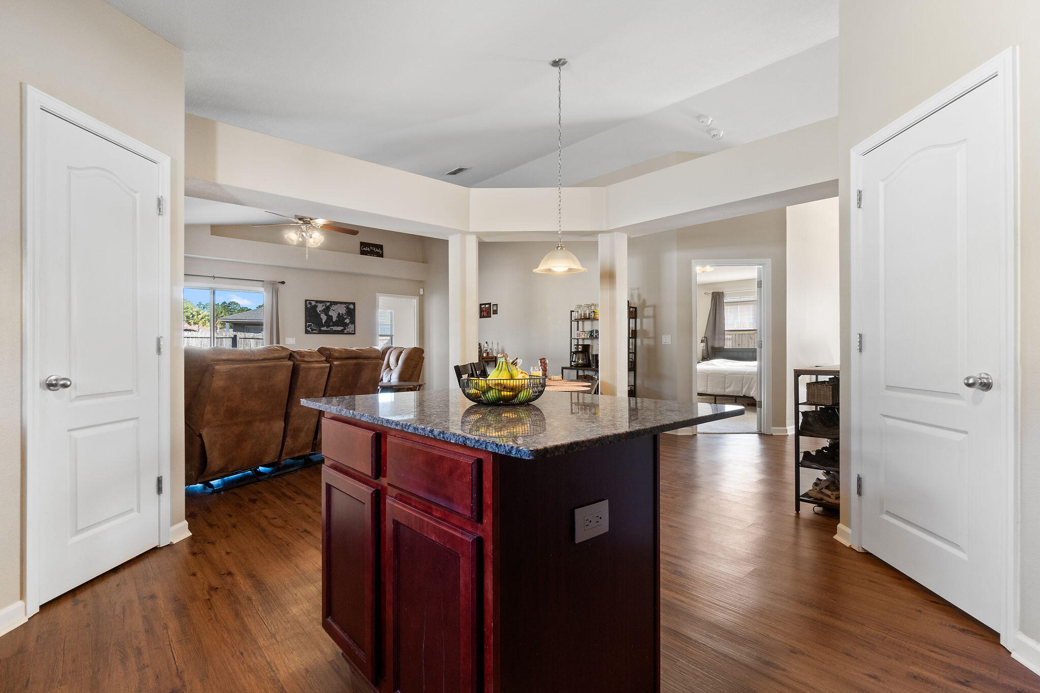 7964 Promise Creek Road Navarre, FL 32566 - Photo 10 of 43 a kitchen with counter top space and wooden floor
