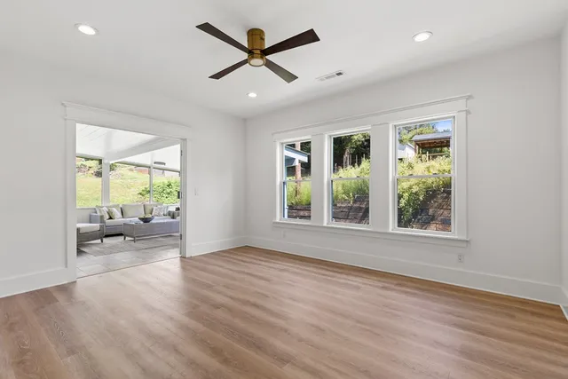 a view of livingroom with furniture window and wooden floor