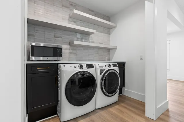a utility room with dryer and washer