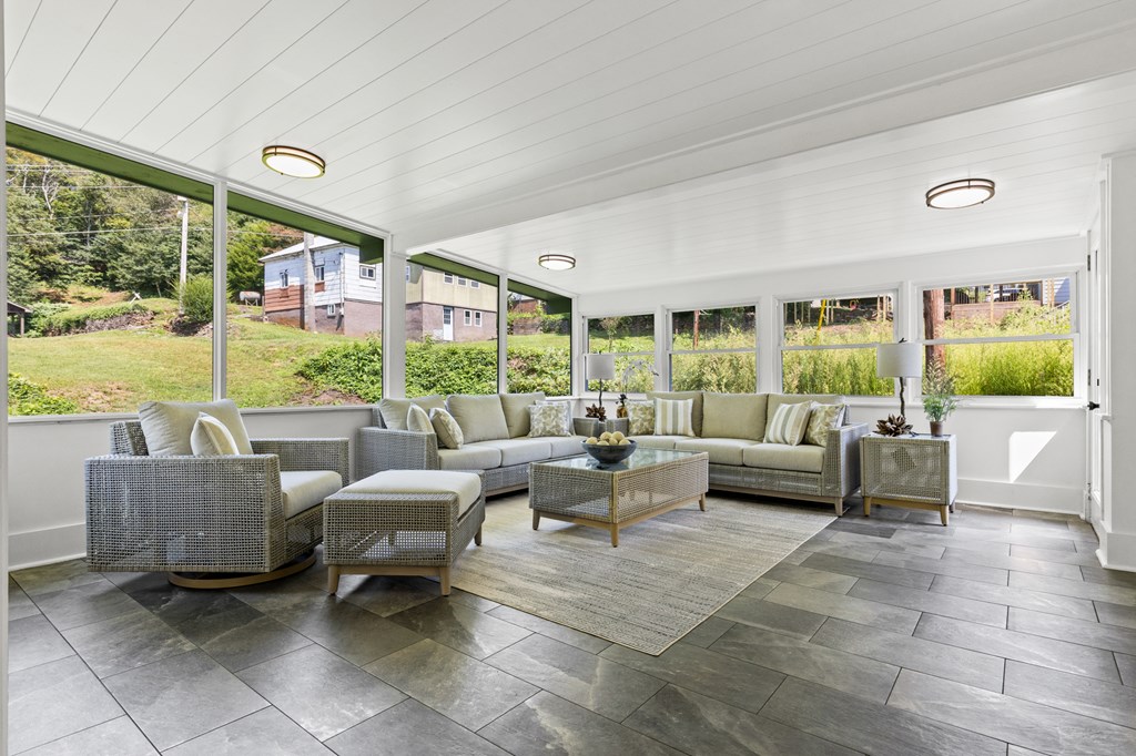 111 Highland Street Copperhill, TN 37317 - Photo 27 of 41 a living room with furniture and a large window