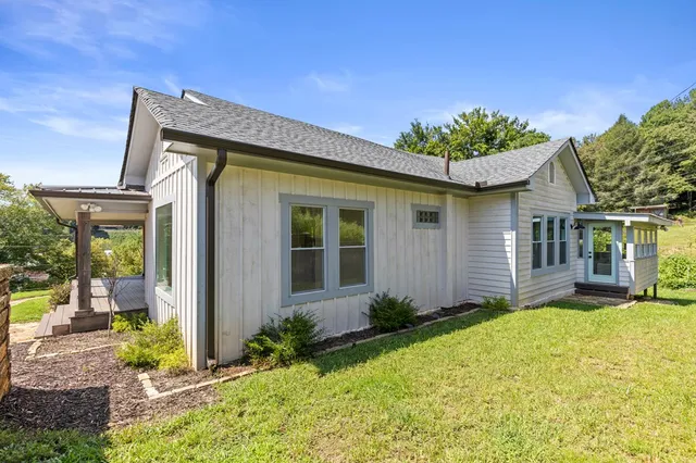 front view of a house with a yard