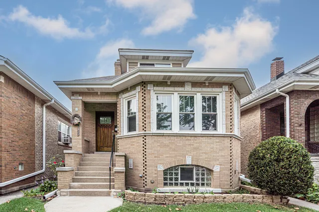 front view of a house with a balcony