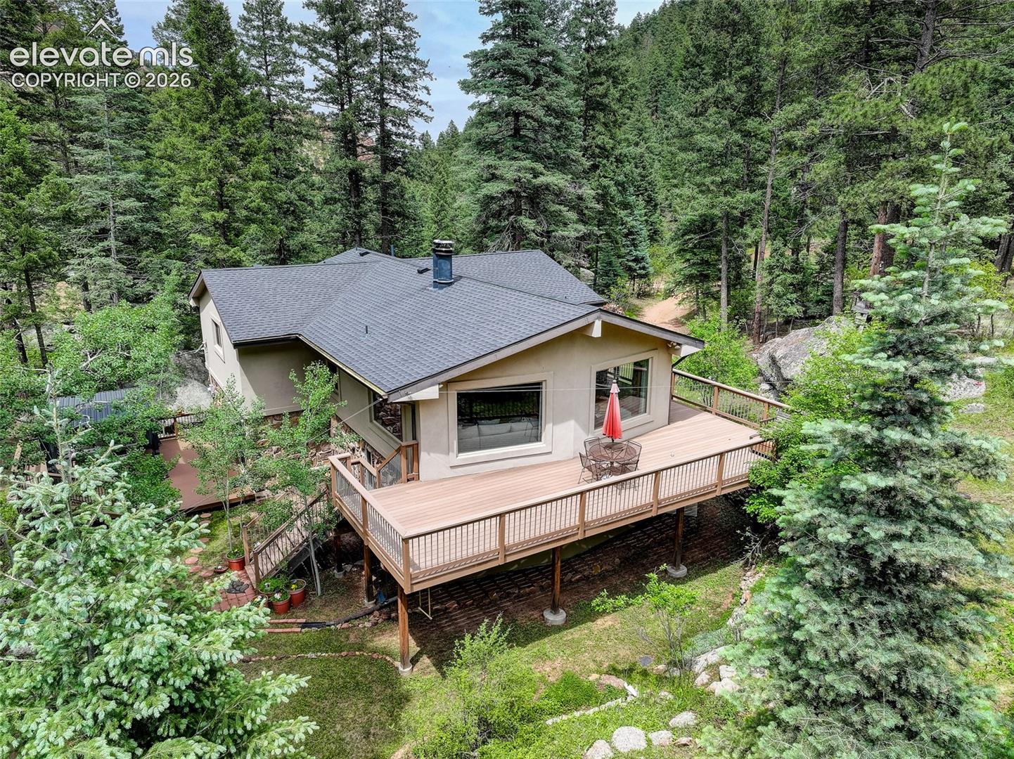 5145 Neeper Valley Road Manitou Springs, CO 80829 - Photo 3 of 49 Look at that wraparound deck!