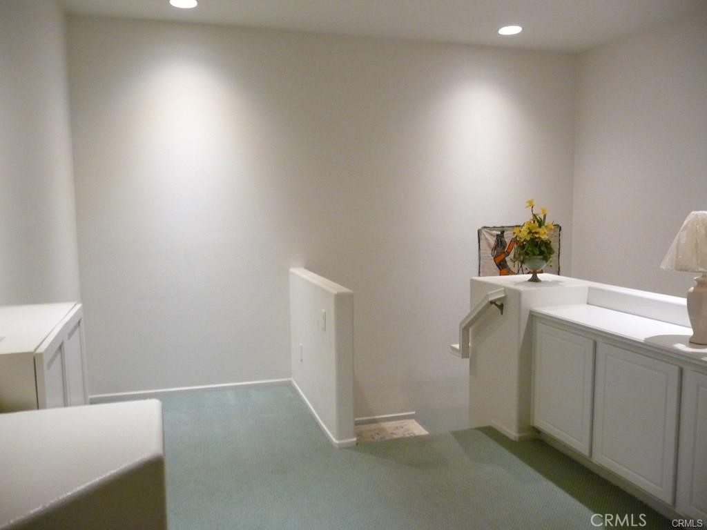 26 Daffodil Irvine, CA 92618 - Photo 13 of 16 a view of storage and utility room with a sink