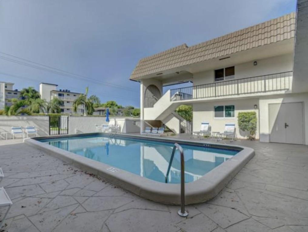 55 Southeast 14th Street, Unit 207 Boca Raton, FL 33432 - Photo 9 of 9 a view of house with outdoor space