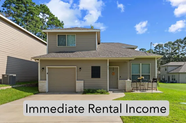 a front view of house with yard