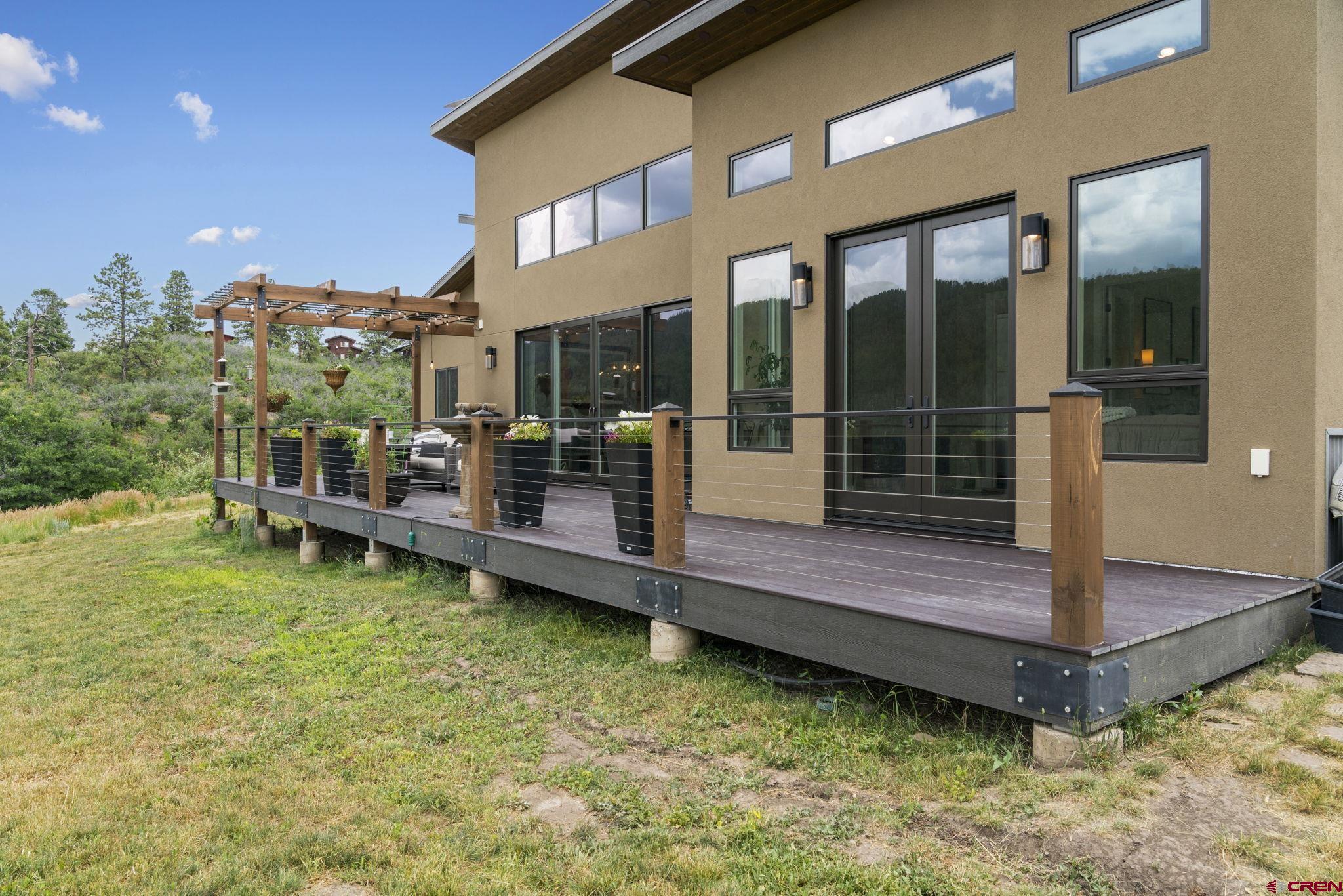 1212 Sunrise Lane Durango, CO 81301 - Photo 29 of 35 a wooden bench sitting in front of building