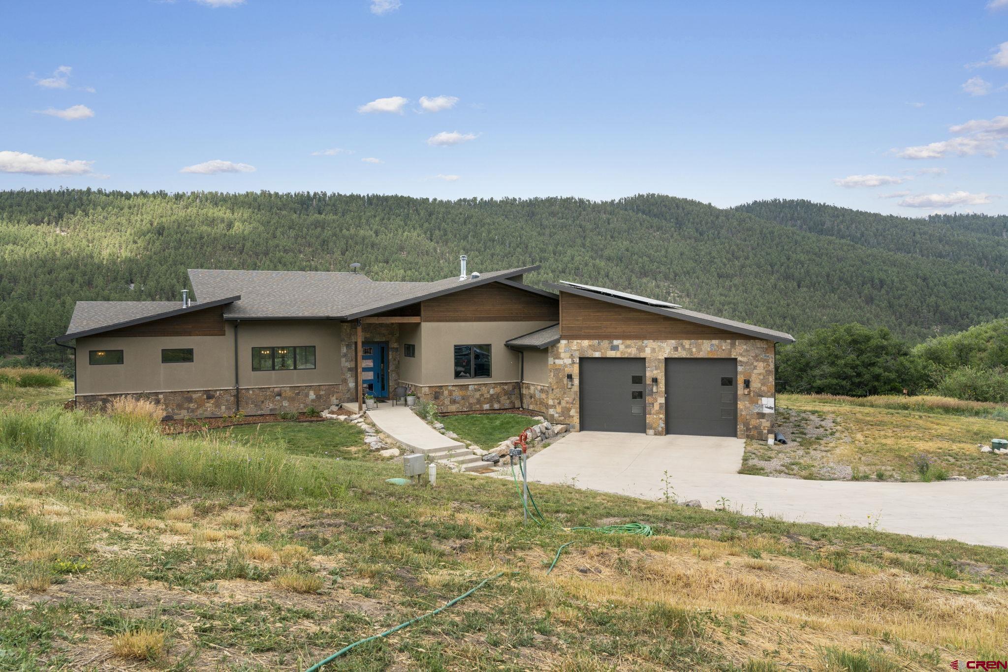 1212 Sunrise Lane Durango, CO 81301 - Photo 35 of 35 a view of a house with a yard