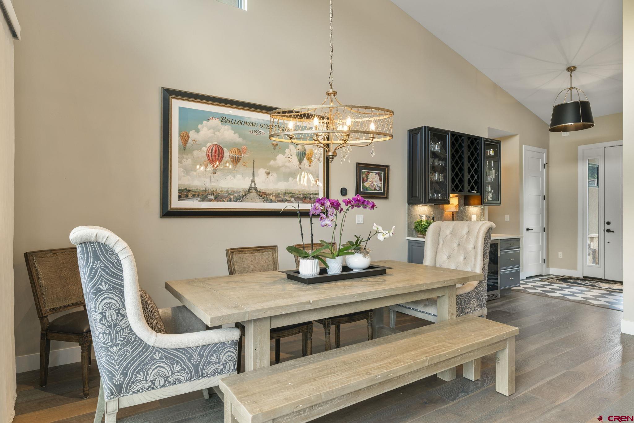 1212 Sunrise Lane Durango, CO 81301 - Photo 7 of 35 a view of a dining room with furniture and chandelier
