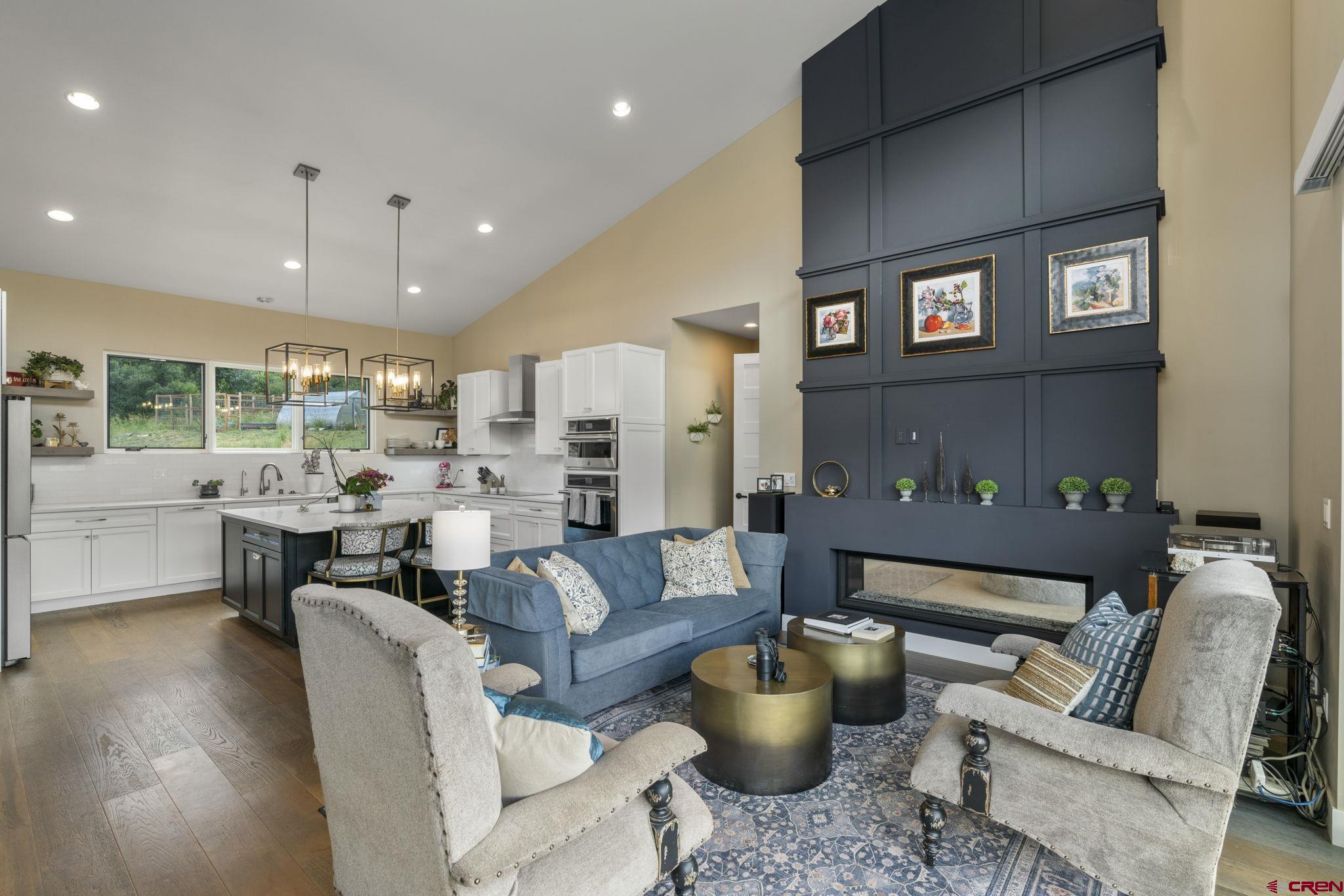 1212 Sunrise Lane Durango, CO 81301 - Photo 10 of 35 a living room with furniture and a large window