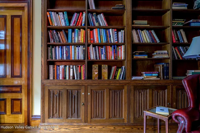 a view of a book shelf with lots of windows