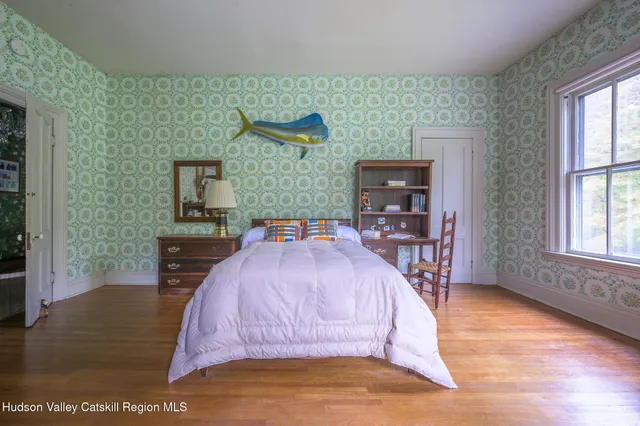a view of hallway with livingroom
