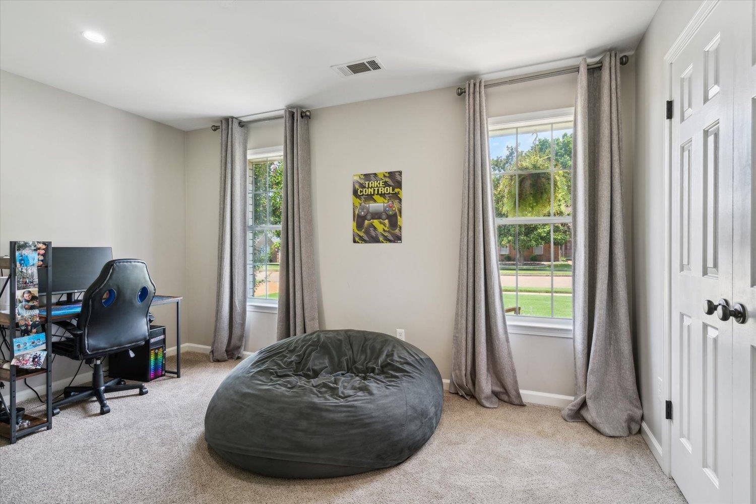 1423 Howling Drive Collierville, TN 38017 - Photo 20 of 28 Office area with a wealth of natural light and light colored carpet