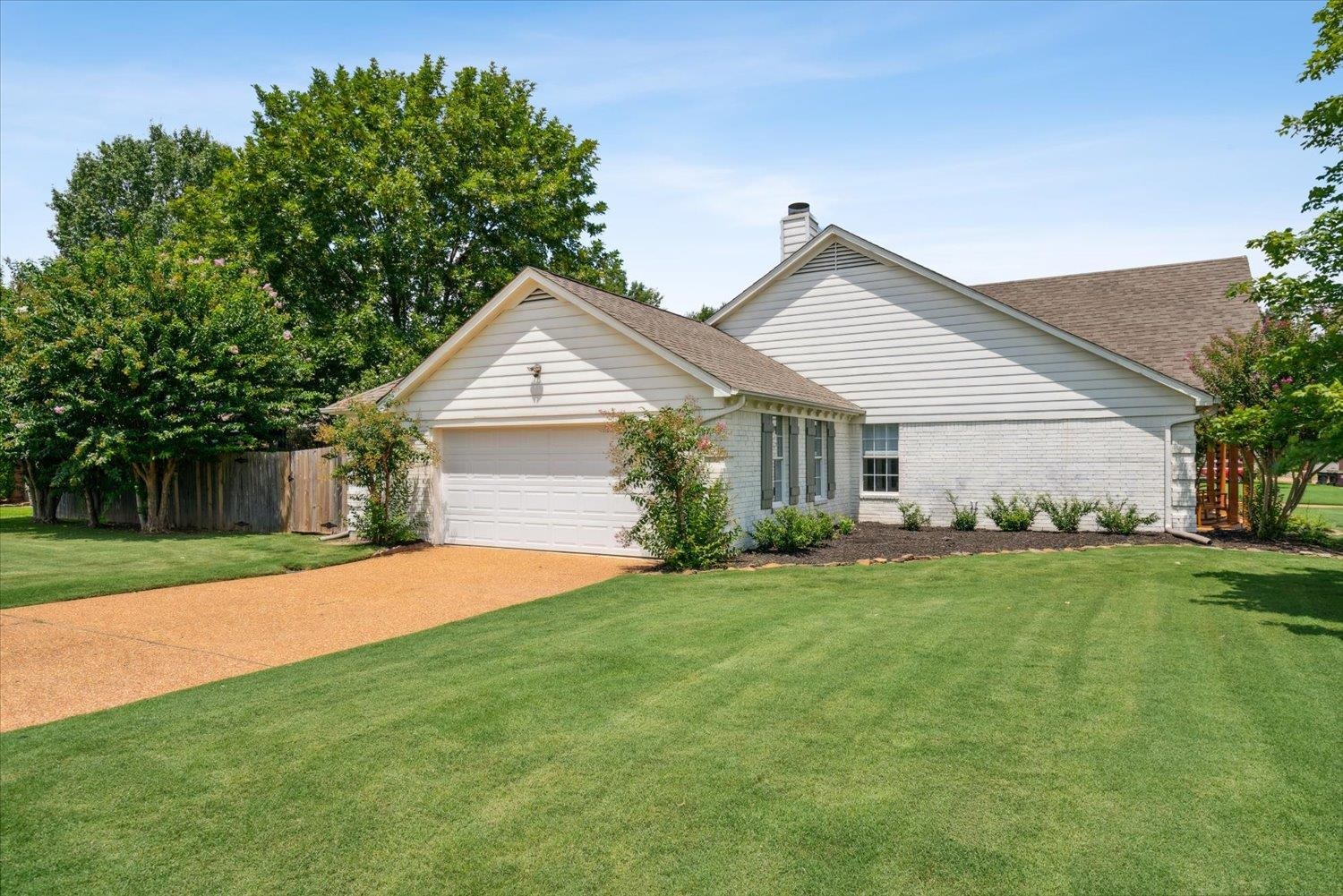 1423 Howling Drive Collierville, TN 38017 - Photo 23 of 28 Ranch-style home featuring a garage and a front lawn