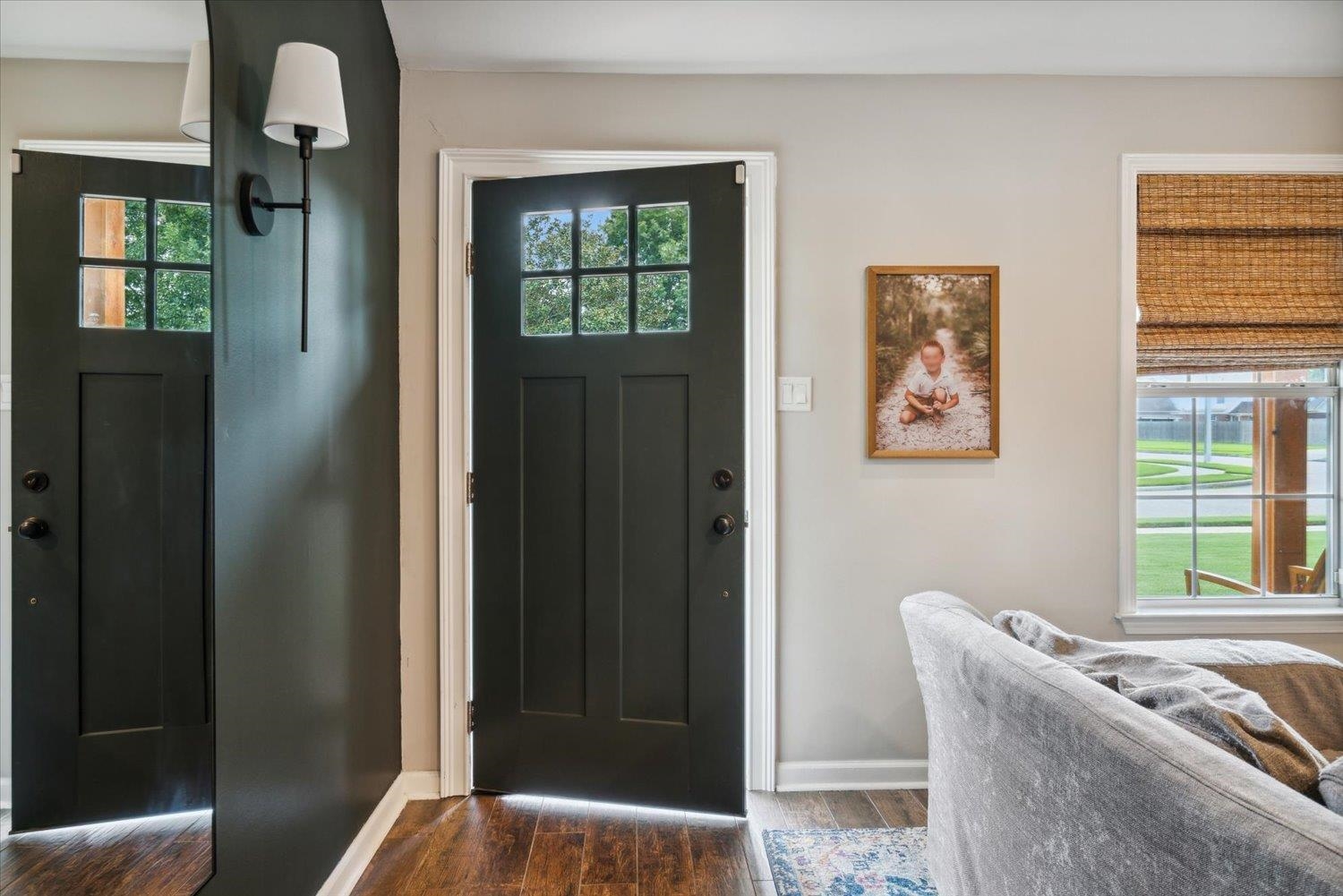 1423 Howling Drive Collierville, TN 38017 - Photo 6 of 28 Entrance foyer featuring dark hardwood / wood-style flooring and plenty of natural light