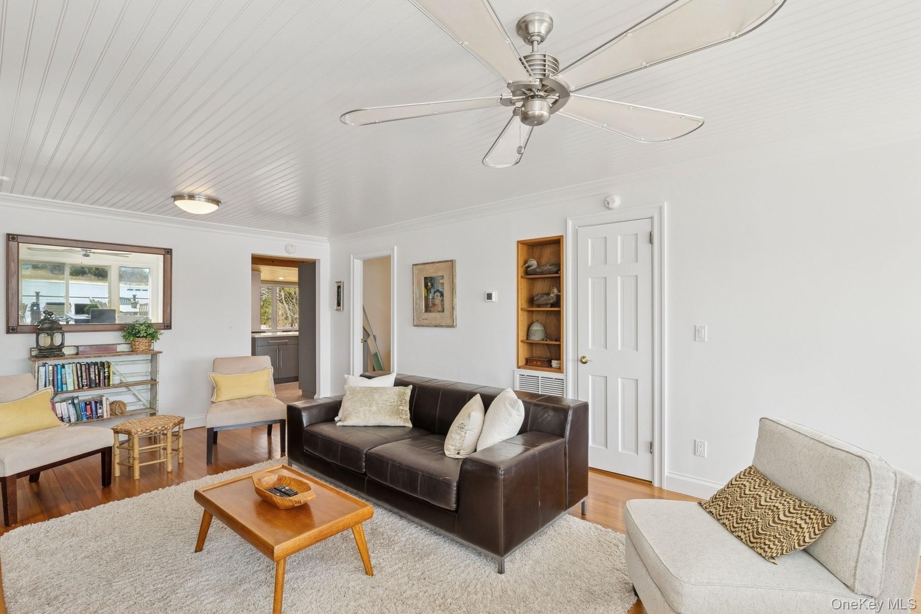 80 Towd Point Road Southampton, NY 11968 - Photo 12 of 30 a living room with furniture and a window