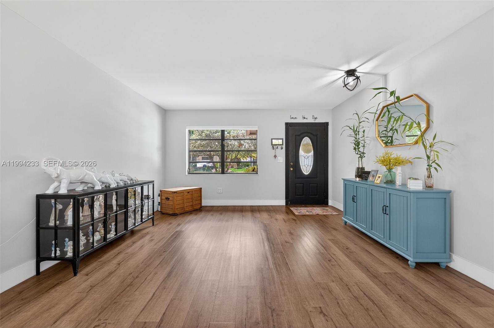 2385 Southwest 131st Place Miami, FL 33175 - Photo 15 of 39 a view of an entryway with wooden floor