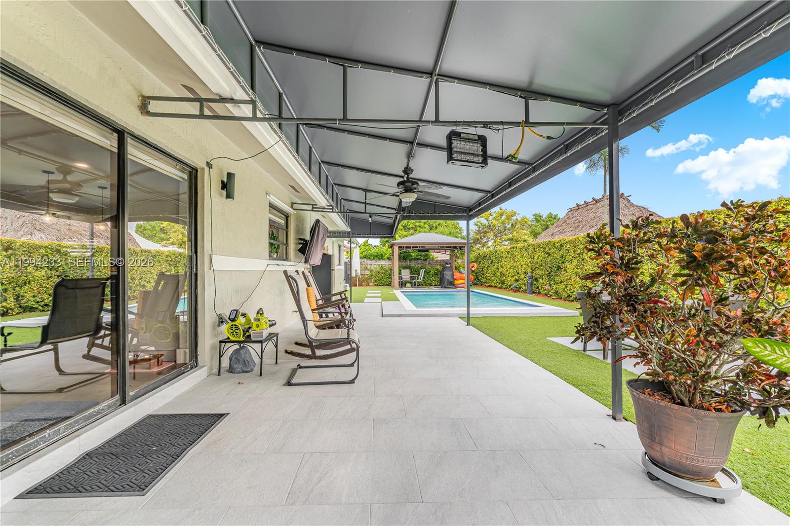 2385 Southwest 131st Place Miami, FL 33175 - Photo 27 of 39 a view of porch with seating space