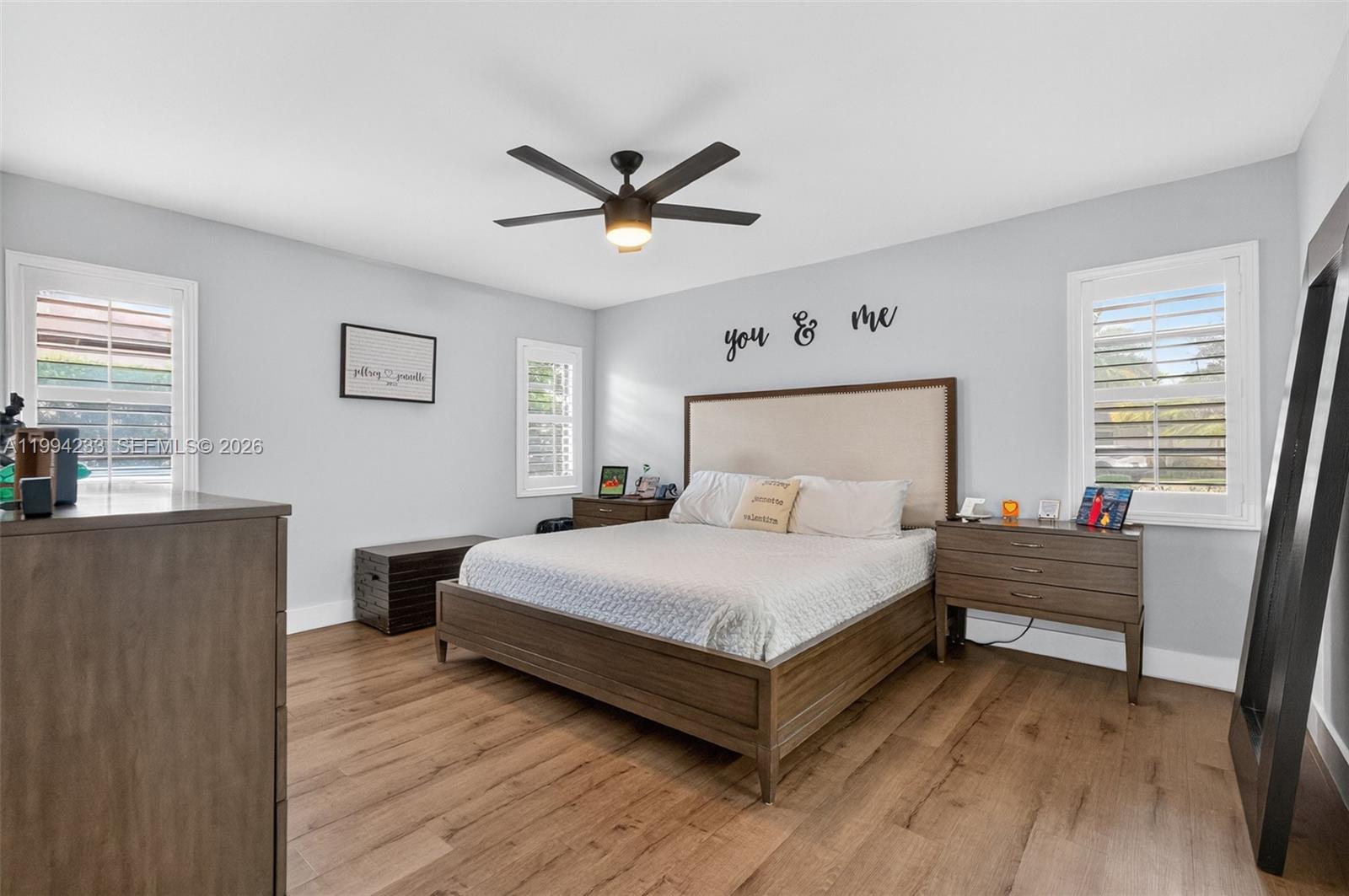 2385 Southwest 131st Place Miami, FL 33175 - Photo 8 of 39 a large bedroom with a bed and a window
