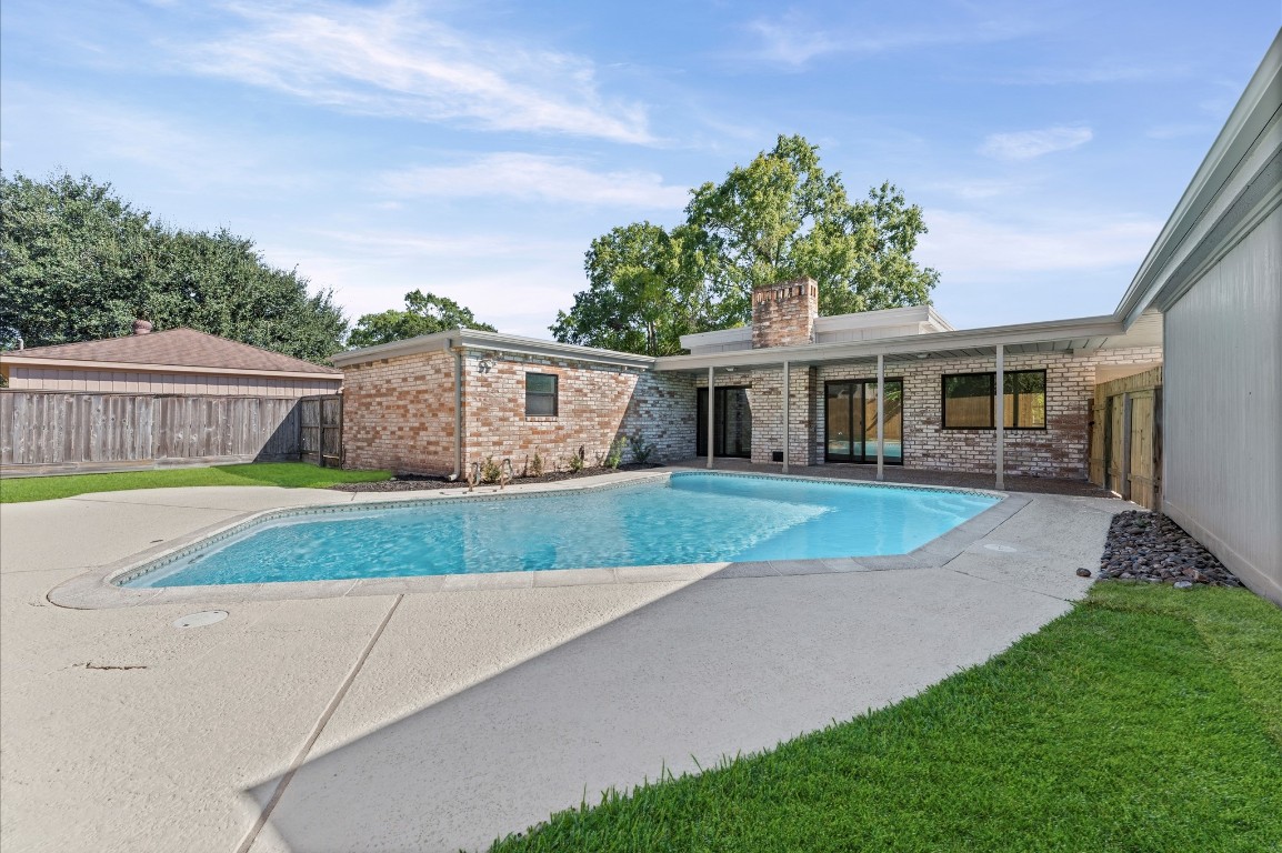 5634 Jason Street Houston, TX 77096 - Photo 24 of 25 a view of house with a yard