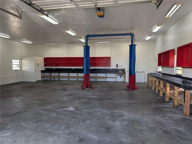 a room with furniture and a flat screen tv