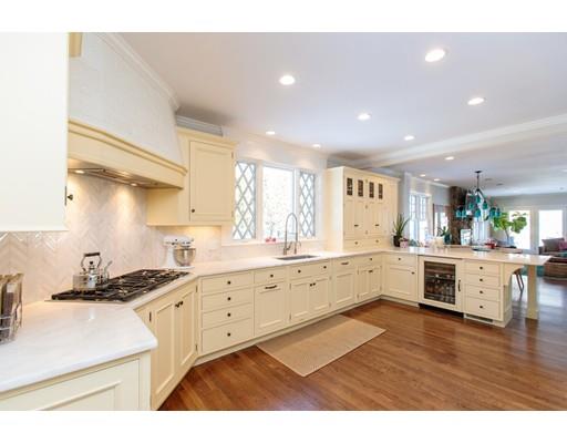 102 Abbott Road Wellesley, MA 02481 - Photo 11 of 21 a kitchen with sink stove and cabinets