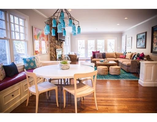 102 Abbott Road Wellesley, MA 02481 - Photo 13 of 21 a dining room with wooden floor a glass table and chairs